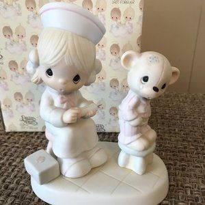 Precious Moments Love Beareth All Things